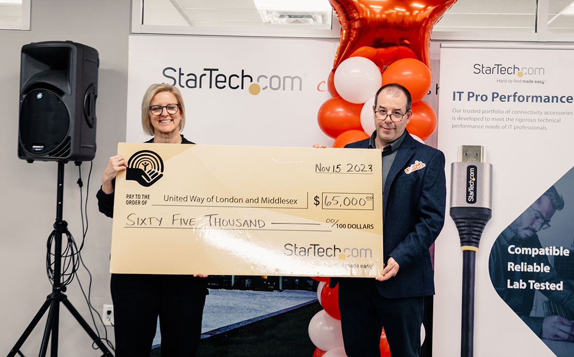 A cheque is presented to United Way during the StarTech.com United Way campaign